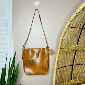 Kelsi Dagger perforated leather bucket hobo bag